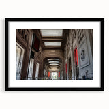 Colorful abstract art print of New York City's Grand Central, in a black frame, ideal for living room decor.