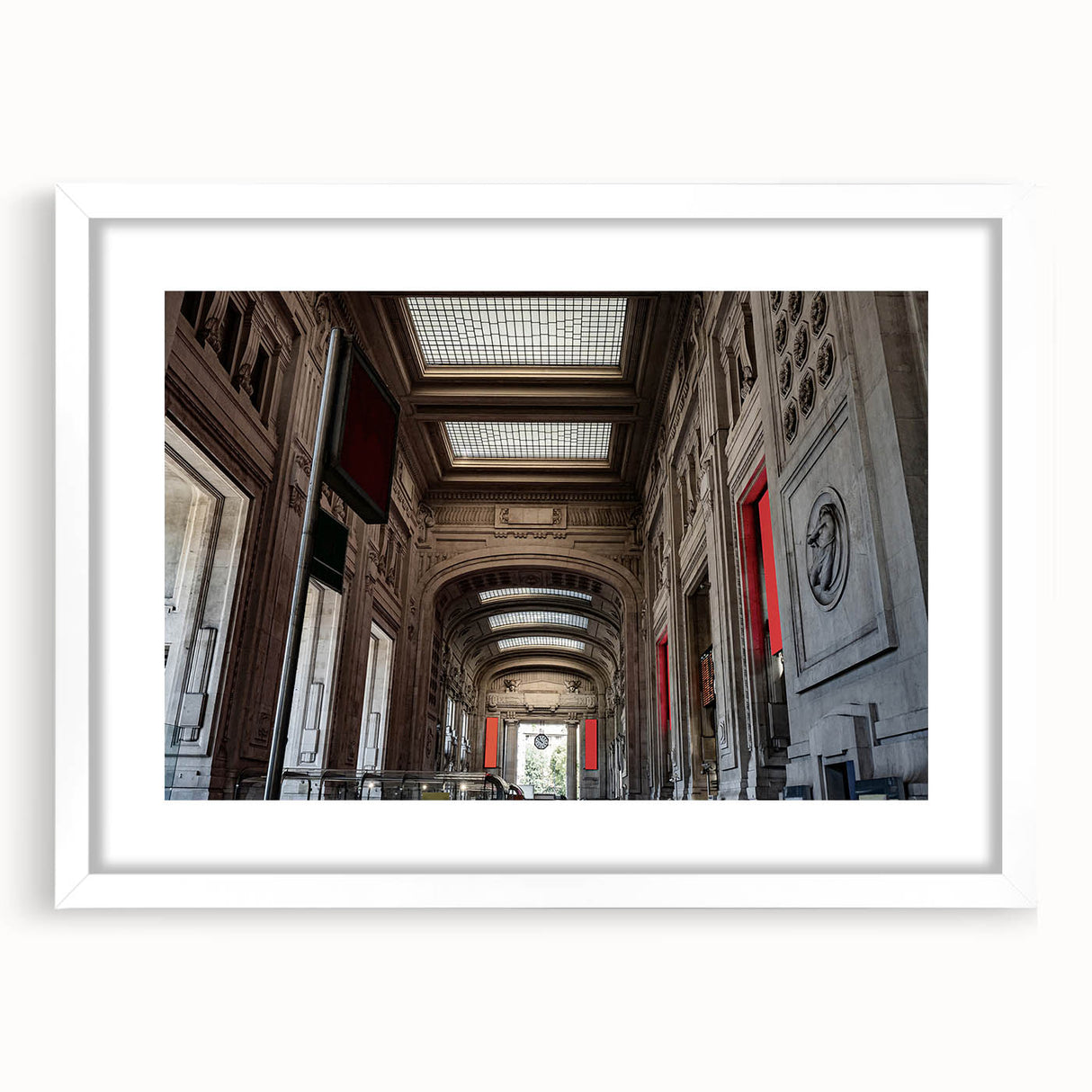 Abstract art print of New York City's Grand Central in muted gray and blue tones on a framed white mat.