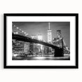 Extra large textured abstract print of Manhattan Bridge in colorful art style on a black framed canvas.