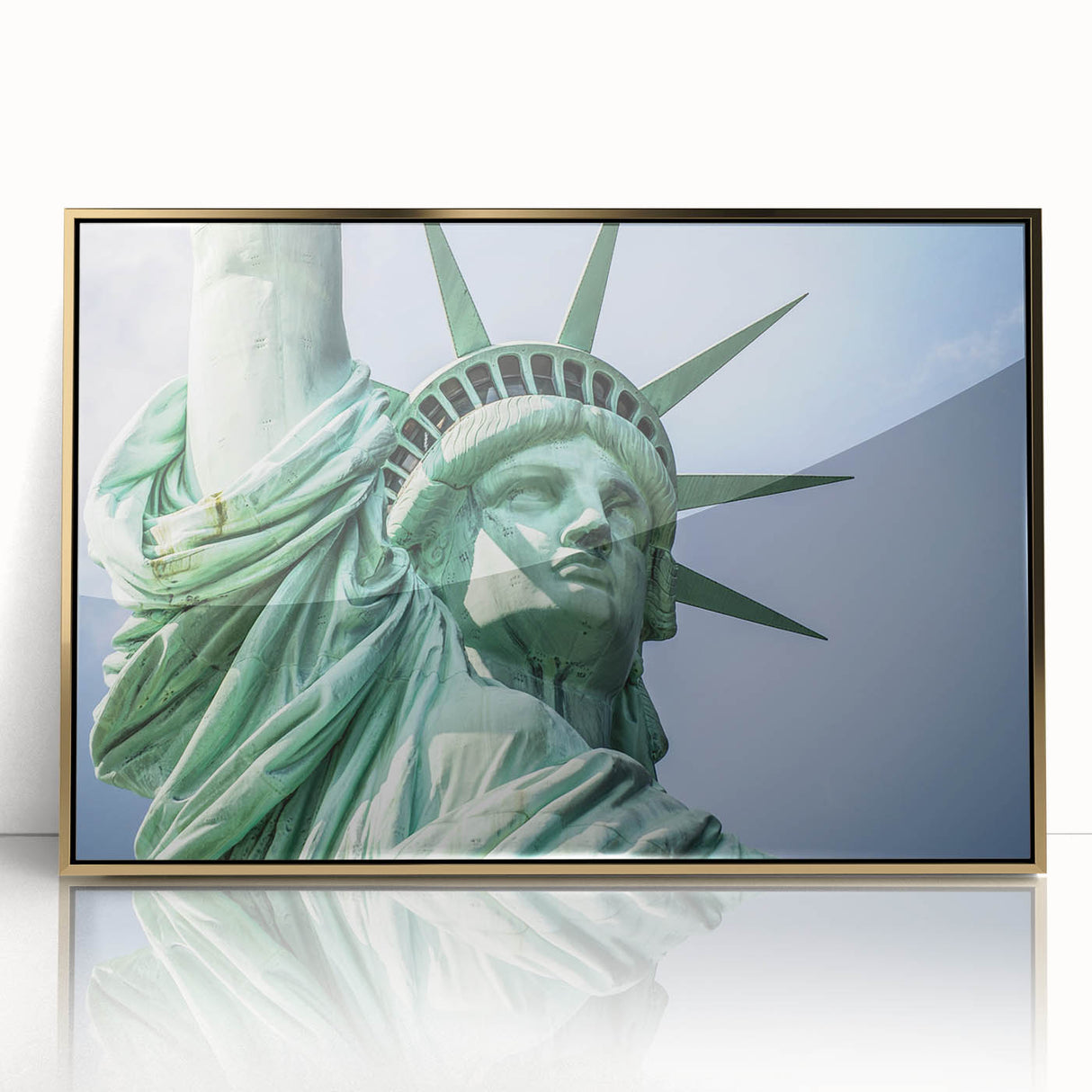 Acrylic print of the Statue of Liberty in gold tones, framed, in a mid-century modernist style.