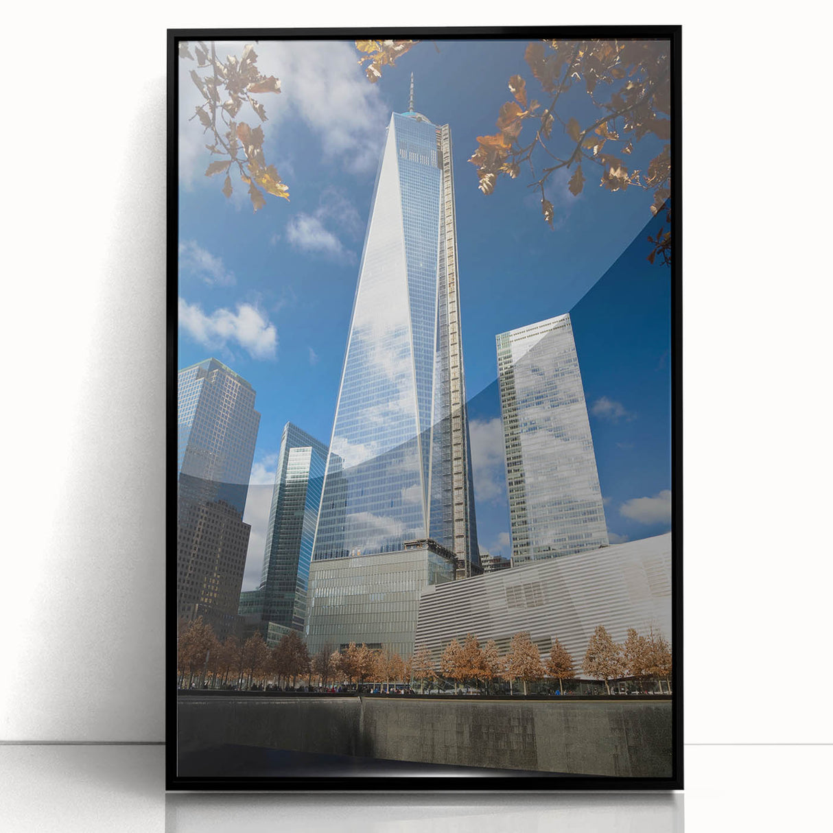 Large abstract wall art depicting the NYC skyline in muted black and gray tones on a framed acrylic.