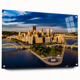 Acrylic print of Pittsburgh skyline in muted gray and blue tones, suitable for bedroom or dining room wall art.