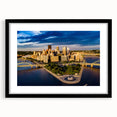 Abstract art print of Pittsburgh skyline in vibrant colors on a large textured canvas, ideal for living room decor.