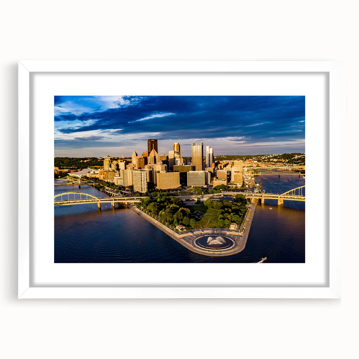 Abstract art print of Pittsburgh skyline in muted gray and blue tones on a framed canvas, suitable for dining room decor.