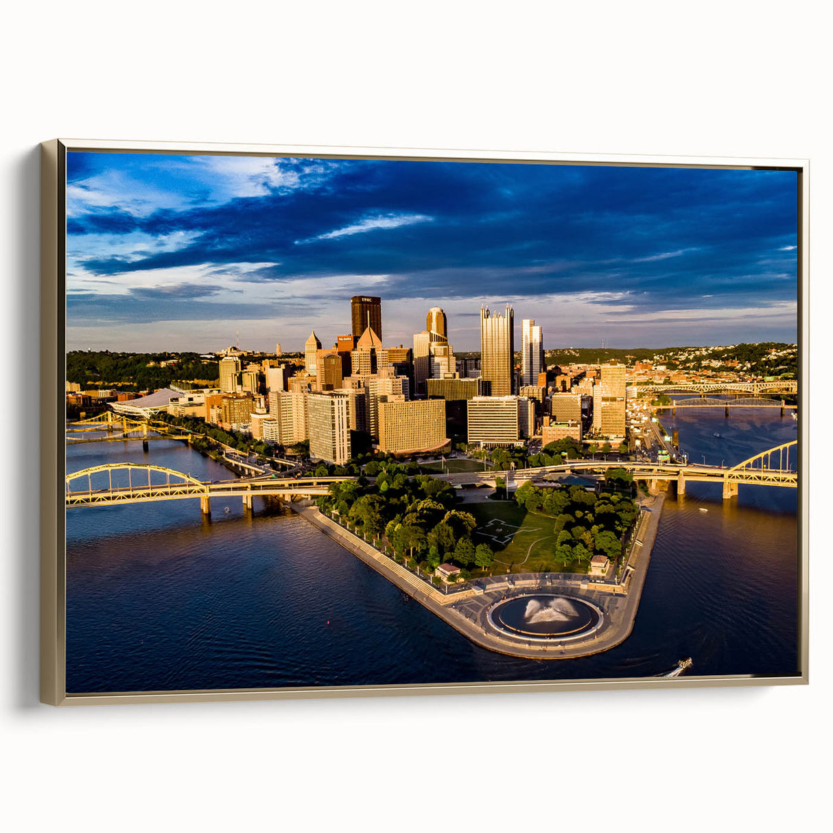 Framed canvas of Pittsburgh skyline in black and gold tones, ideal for bedroom wall art.