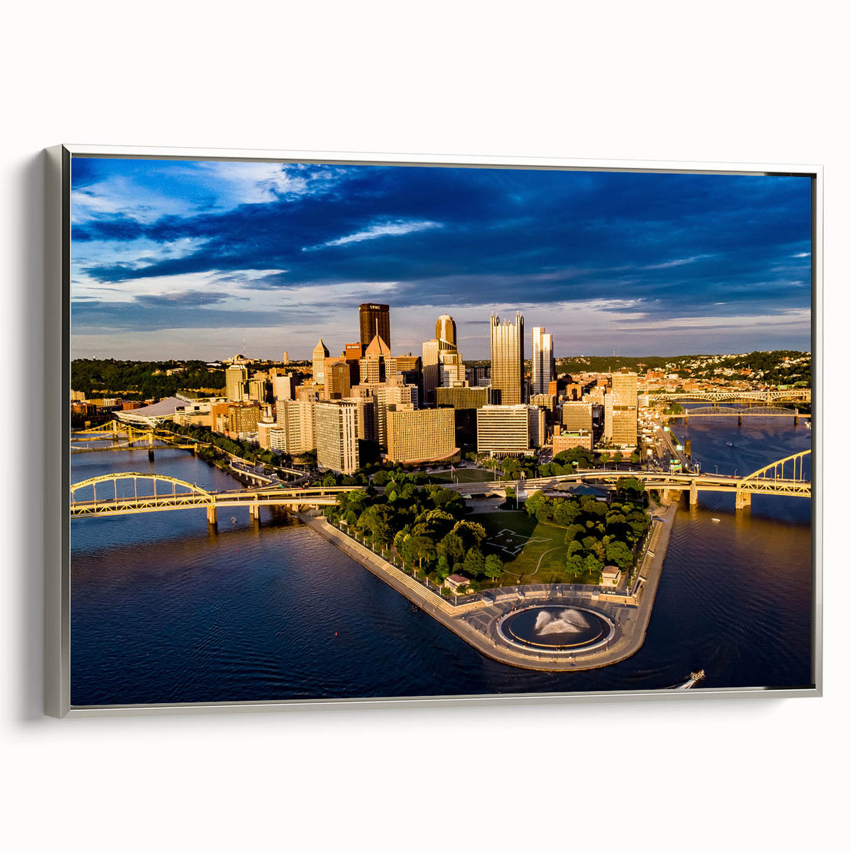 Framed canvas of a colorful Pittsburgh landscape in vintage poster style, ideal for modern living room decor.