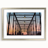 Textured art print of San Antonio skyline in muted gray and blue tones on a framed silver mat, suitable for bedroom decor.