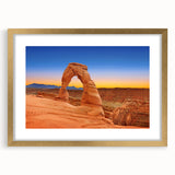 Extra large abstract art print depicting Arches National Park in textured gold frame, ideal for living room decor.