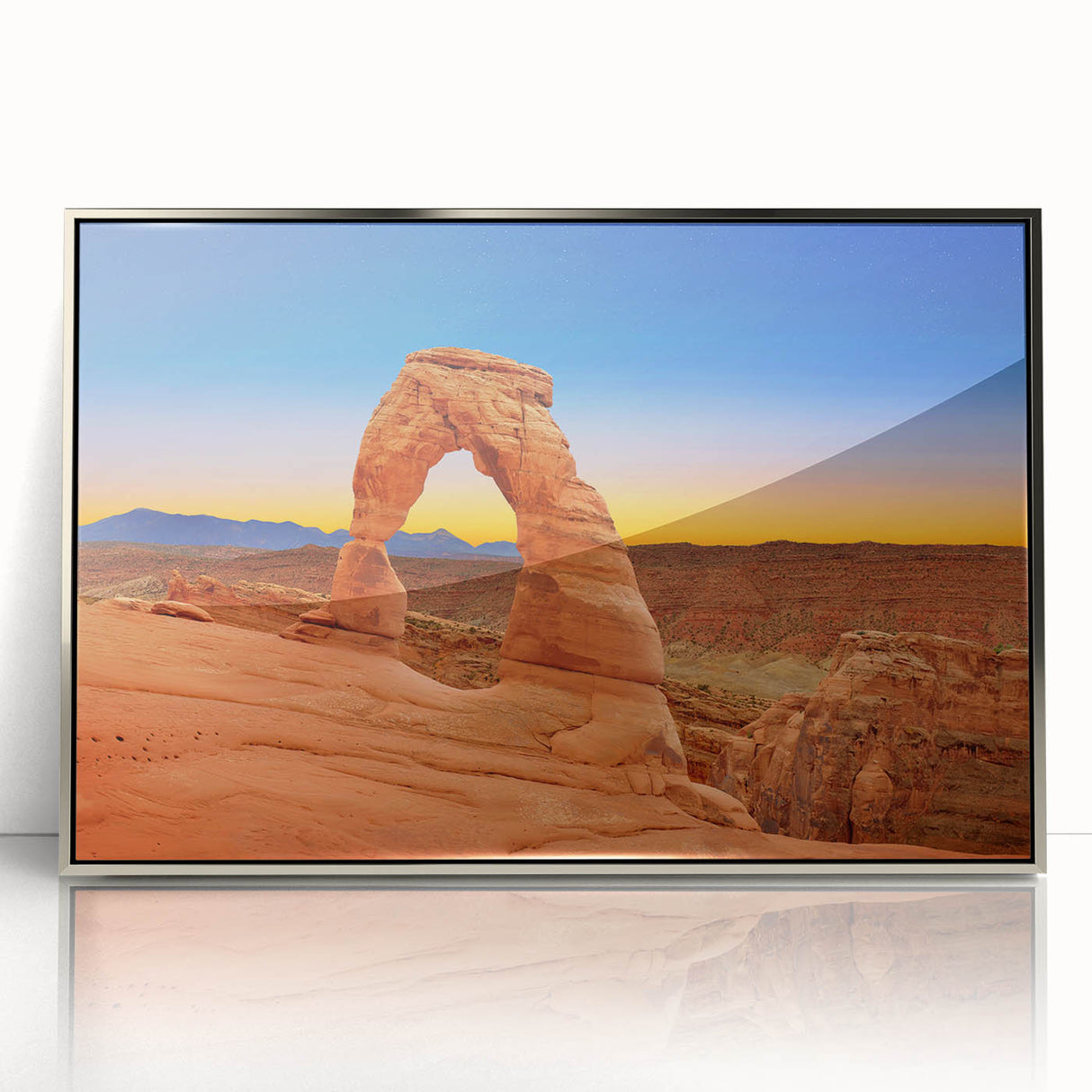 Mid-century modernist art of Arches National Park in Utah, rendered in warm earth tones on a silver-framed acrylic print.