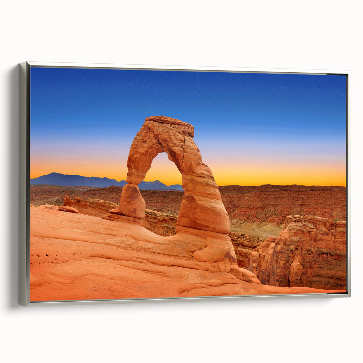 Framed canvas of Arches National Park landscape in Utah, featuring vivid sunset colors, ideal for living room decor.