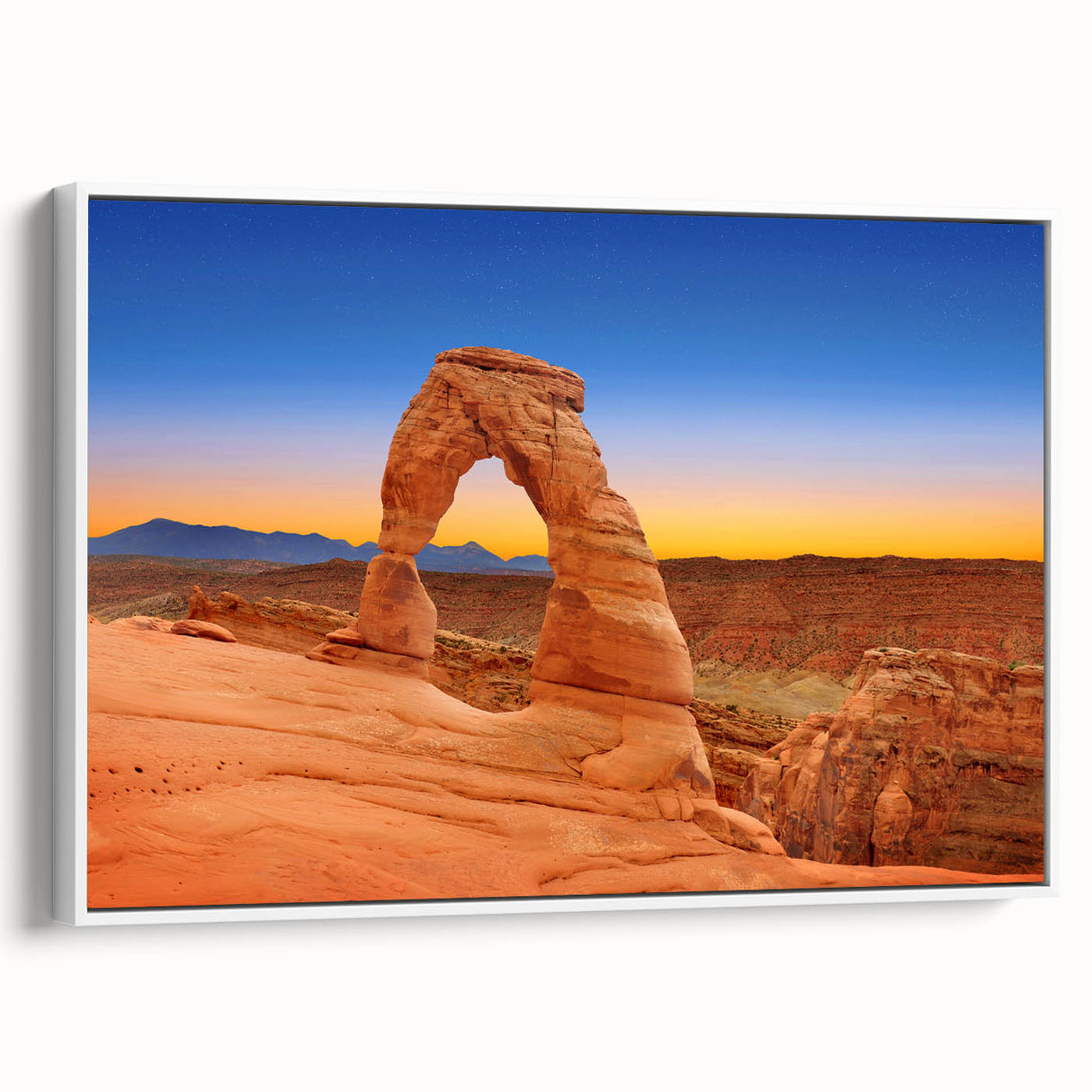 Vintage poster art of Arches National Park on a framed canvas, featuring a colorful desert landscape.