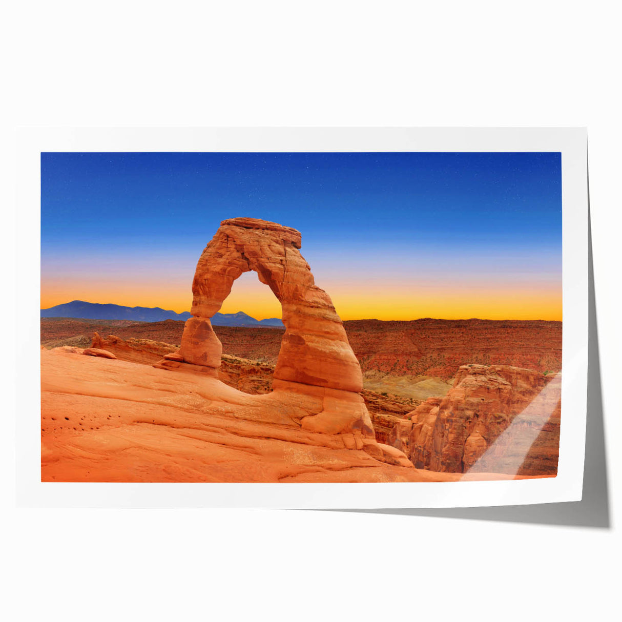 Rolled print of Arches National Park in Utah featuring orange and red rock formations, ideal for dining room wall art.
