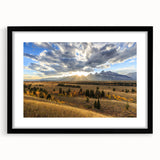 Colorful abstract art print of Wyoming's Grand Tetons in a black frame, ideal for living room decor.