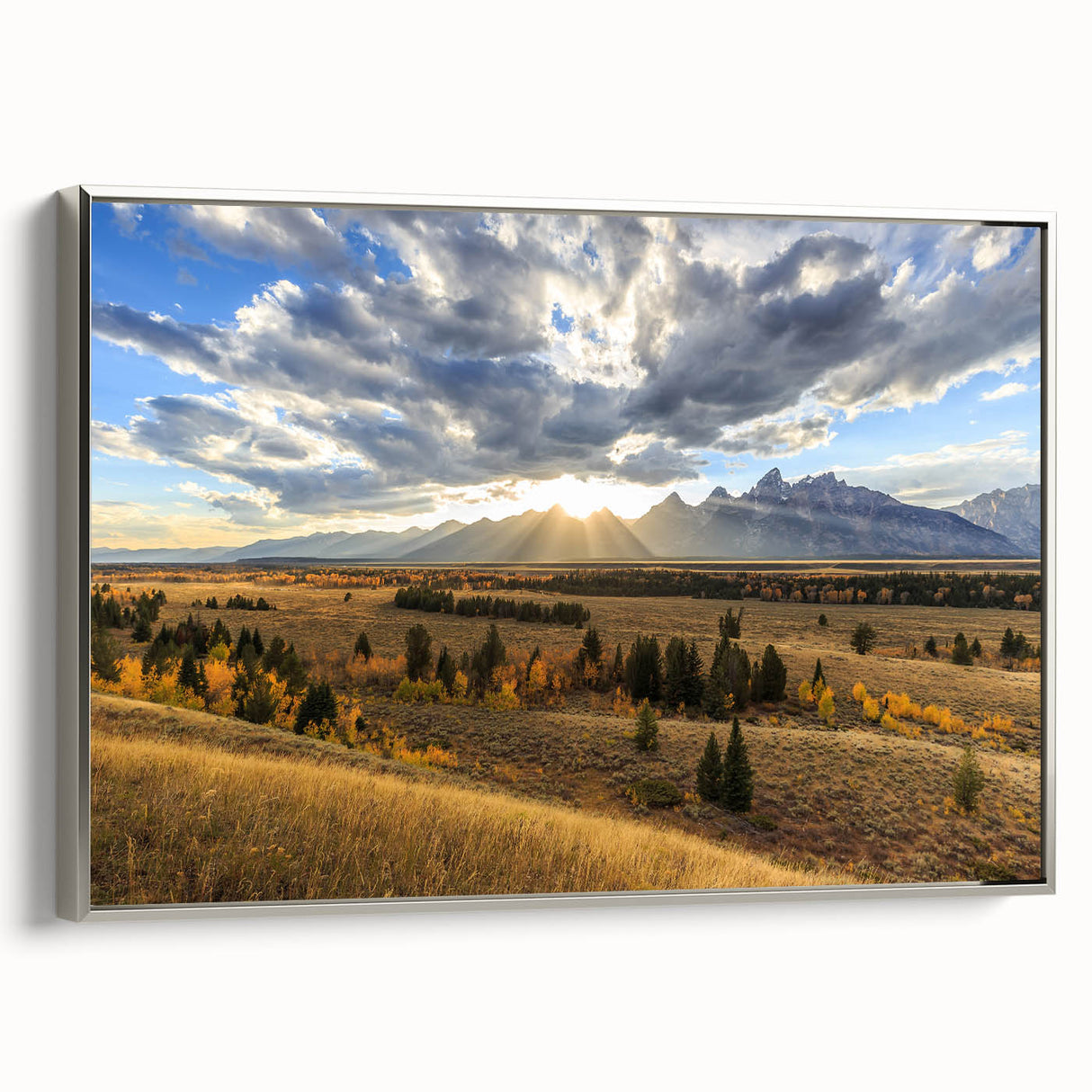 Framed canvas landscape art painting featuring the Grand Tetons under a colorful sky, ideal for living room decor.