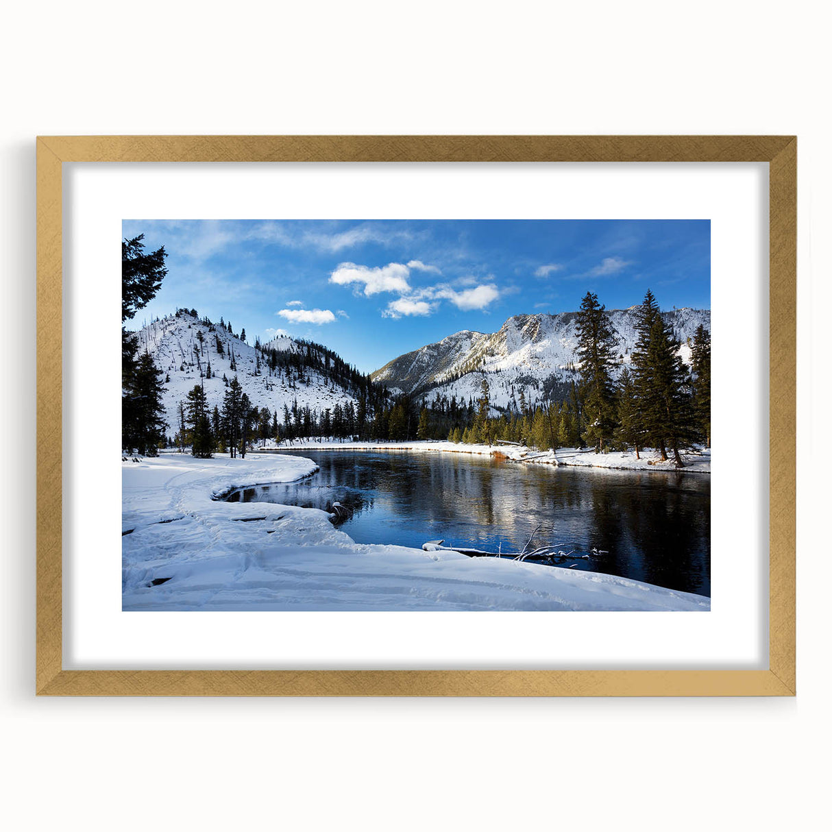 Textured abstract art print of Yellowstone scenery in muted earth tones, framed in gold.