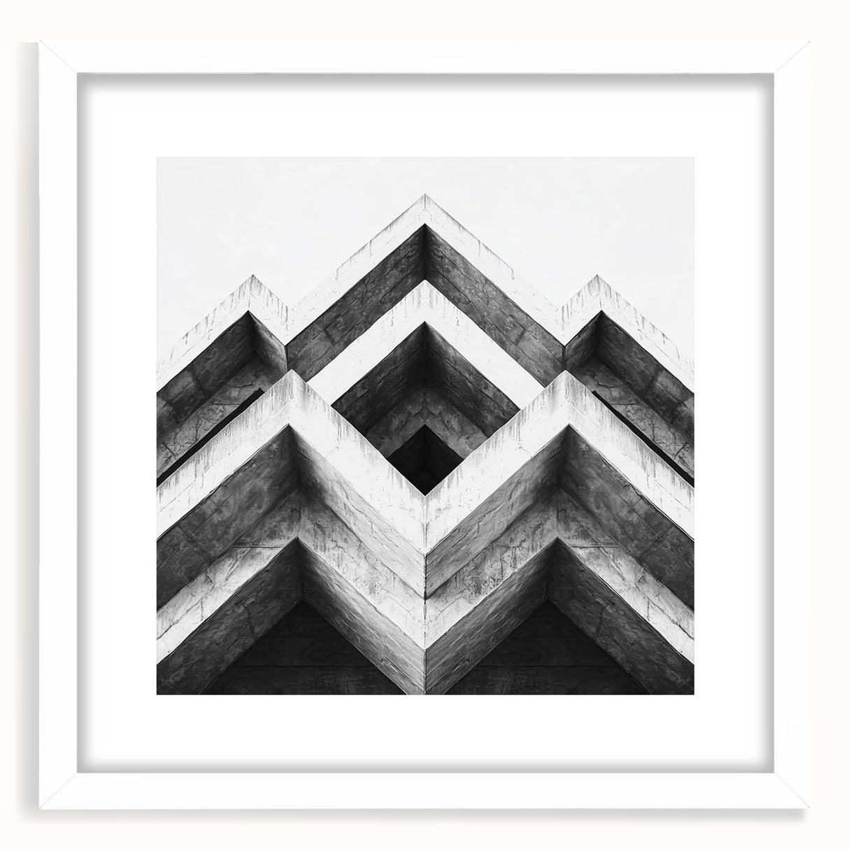 Abstract art print featuring swirling blue and gray patterns on a white framed canvas.