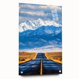 Landscape acrylic glass artwork showcased from a side view, featuring vivid colors and sharp details, secured with decorative pins for a modern display aesthetic.