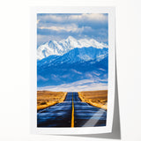 Rolled canvas print showcasing a vibrant African landscape design, featuring rich colors and intricate details, securely packaged in a durable cardboard tube for safe delivery.
