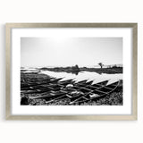 Abstract art print of an African Mali scenery in muted earth tones on a framed silver matte canvas.