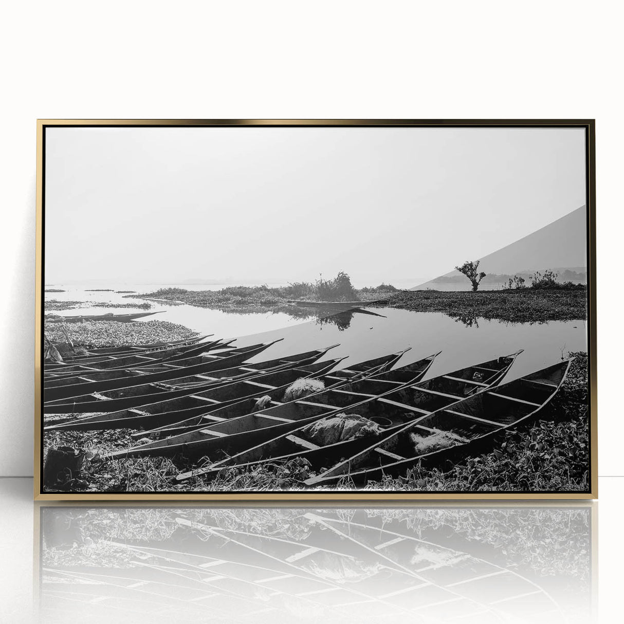 Mid-century modernist art depicting a Mali landscape in gold and brown tones on a framed acrylic.