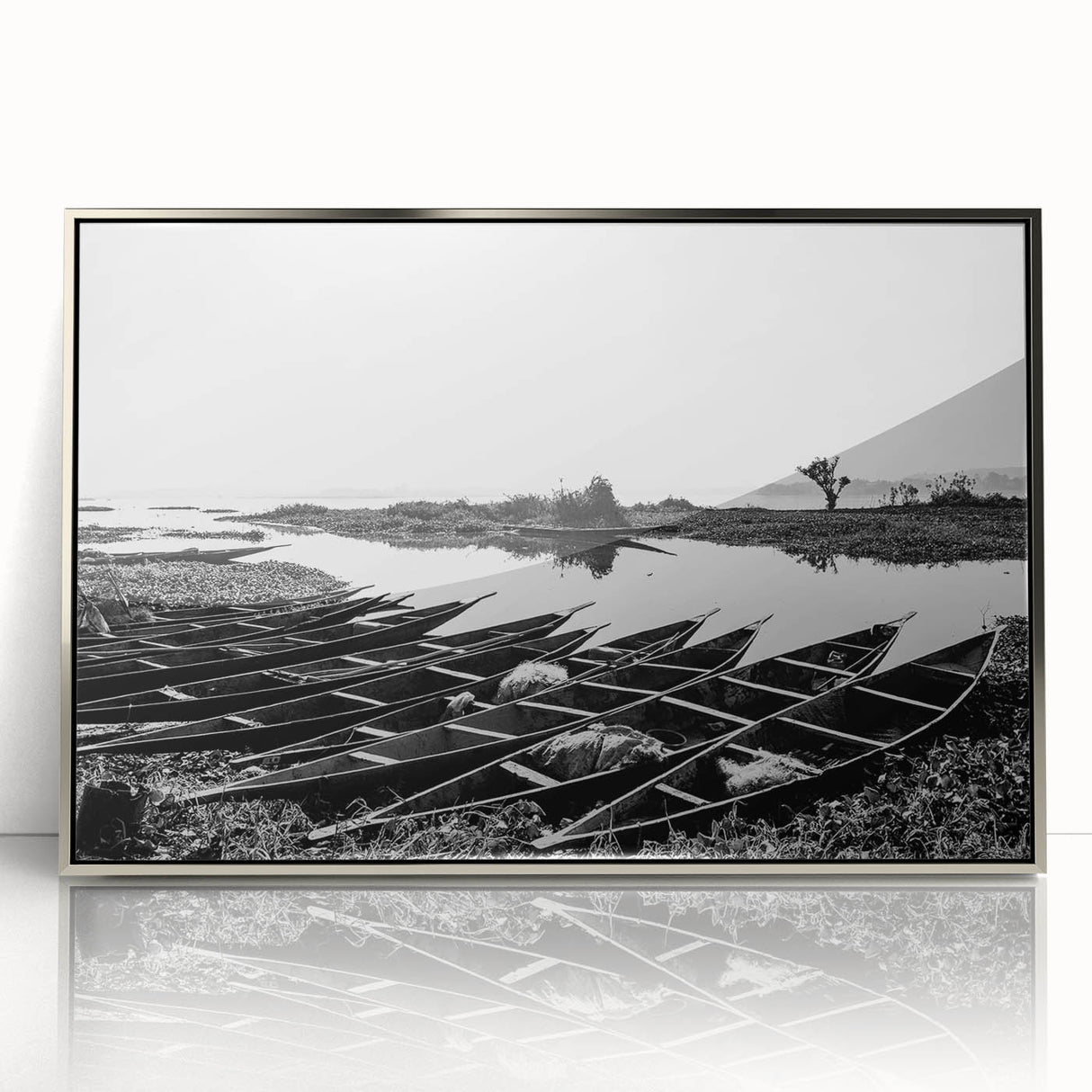 Acrylic print of a Mali scenery in muted earth tones, framed in silver, suitable for modern art wall decor.