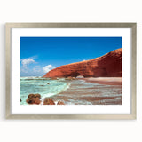 Abstract art print of a Moroccan landscape in muted earth tones on a framed silver mat, suitable for dining room decor.