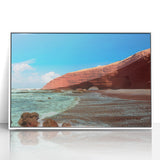 Large art print of a Moroccan landscape in mid-century modernist style, featuring earthy tones on framed acrylic.