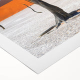 Art deco style poster of a Namibian landscape on rolled canvas, displaying muted earth tones, suitable for dining room decor.