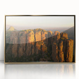 Acrylic print of an African scenery with gold frame, featuring earthy tones, ideal for nursery wall decor.