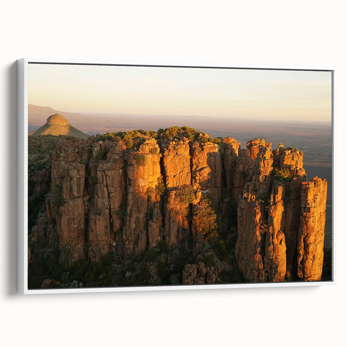 Vintage poster art of an African landscape on a framed canvas, featuring vibrant colors and ideal for living room decor.