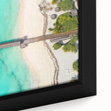 Extra large framed canvas featuring a textured depiction of a Tanzanian scenery in black with vibrant colorful accents.