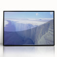 Large abstract wall art depicting an Antarctic landscape in muted gray and blue tones, framed in black acrylic.