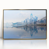 Framed acrylic print of Hong Kong skyline in gold and blue tones, mid-century modernist style.