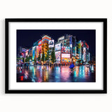 Extra large abstract art print of Tokyo scenery in vibrant colors on a textured canvas, framed in black.