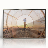 Mid-century modernist art depicting Myanmar scenery in muted earth tones on a silver-framed acrylic print.