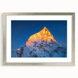 Textured art print of Mount Everest in abstract style, with cool blue and white tones, framed in silver.