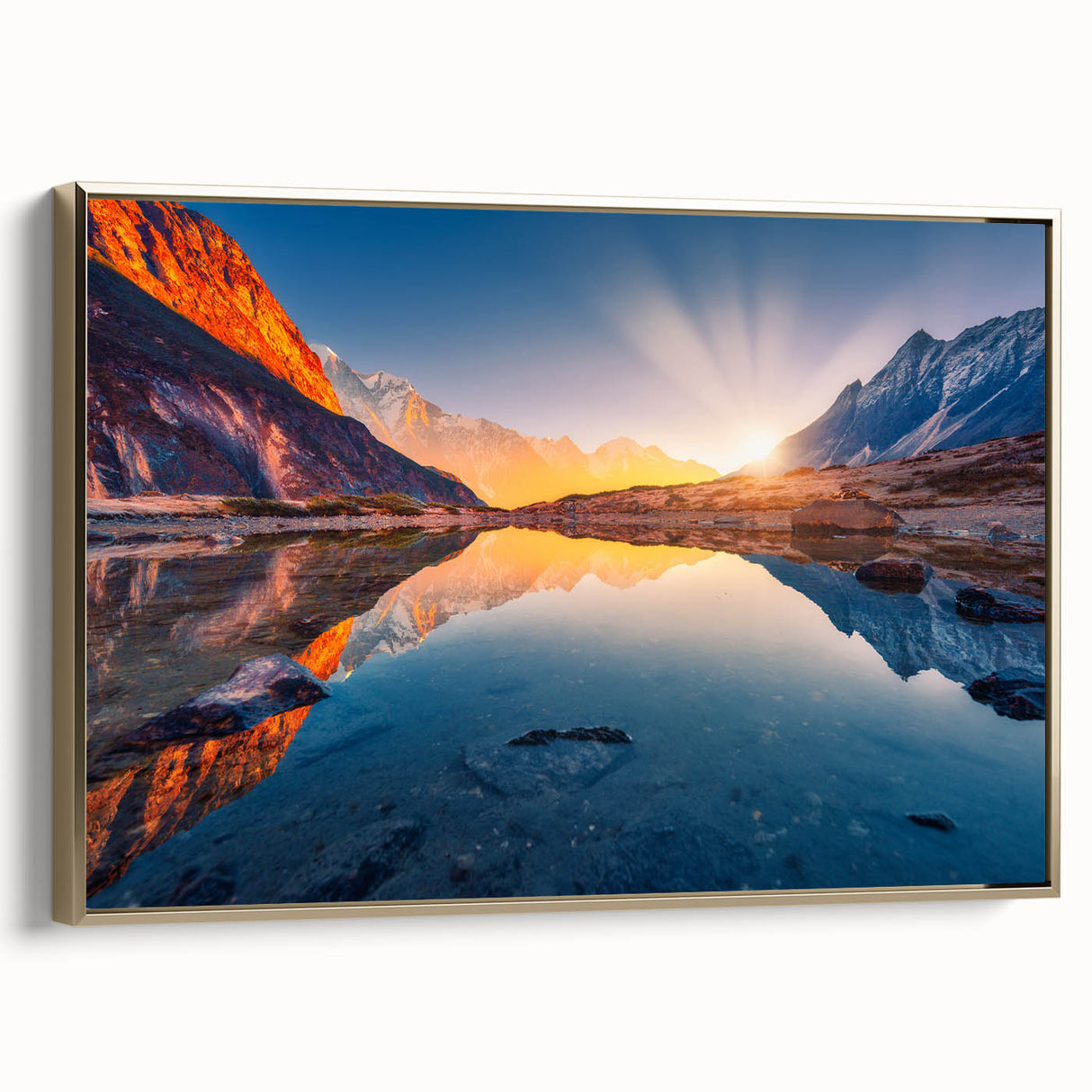 Framed canvas featuring a vintage landscape painting of a Nepalese scenery in black and gold tones.