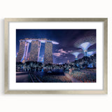 Textured abstract art print of Singapore skyline in muted gray and blue tones, framed with a silver mat.