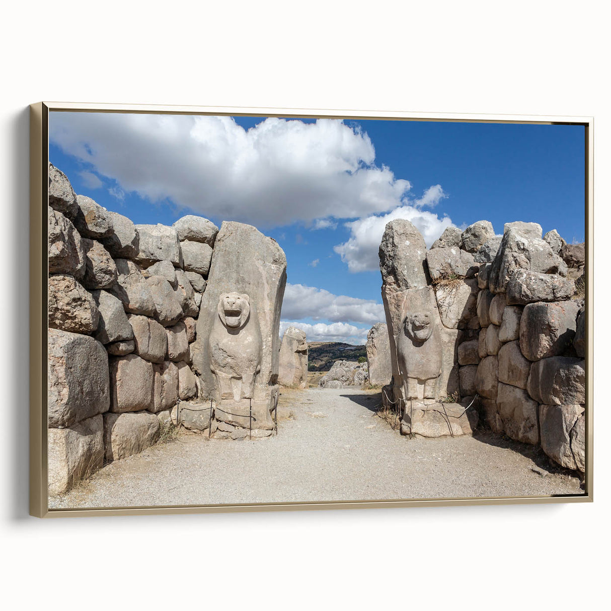 Framed canvas featuring a vintage-style landscape painting of a Turkish scenery in muted gold and black tones.