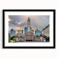 Abstract art print of colorful, textured scenery of Brisbane in a black frame.