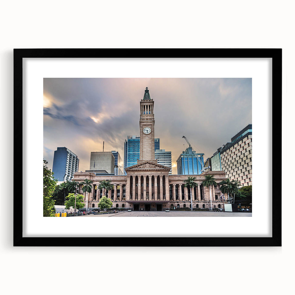Abstract art print of colorful, textured scenery of Brisbane in a black frame.