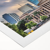 Art deco poster of Brisbane skyline in muted gold and teal tones on rolled canvas, suitable for dining room wall art.