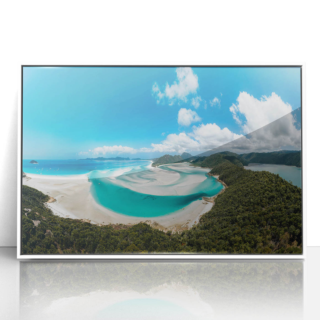 Acrylic print of the Great Barrier Reef in Australia, in vibrant blue and green tones, framed in white.