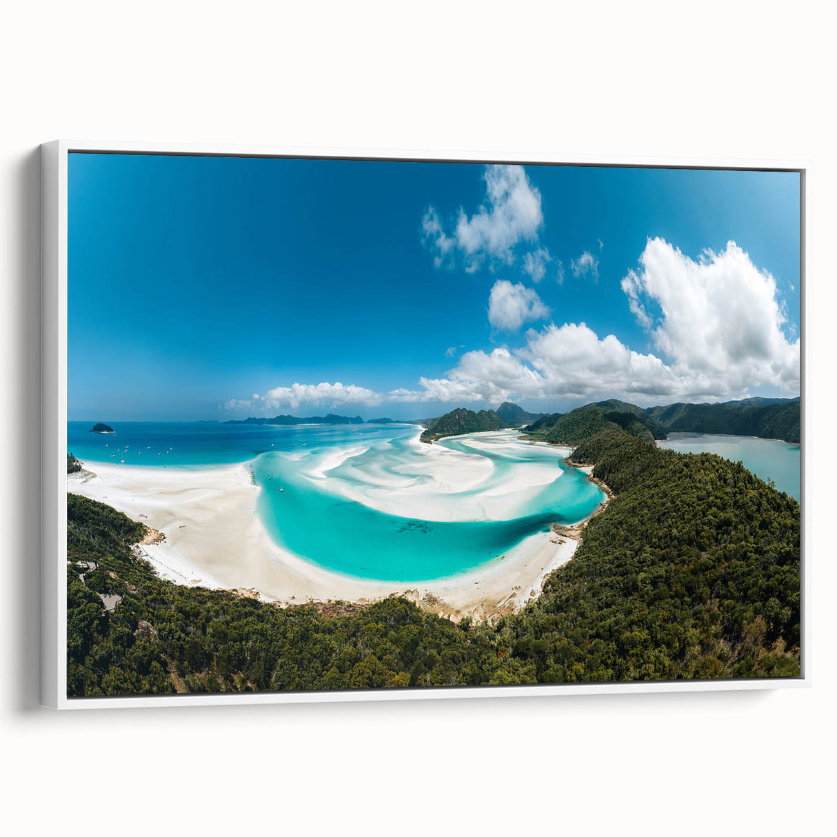Framed canvas featuring a vintage-style landscape painting of the Great Barrier Reef in muted blue and green tones.