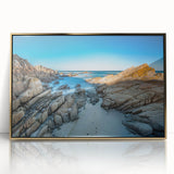 Mid-century modernist art depicting Tasmania landscape in gold and green tones on a framed acrylic print.