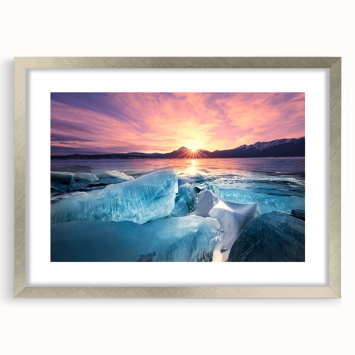 Textured abstract art print of Alberta scenery in muted earth tones, framed in silver, ideal for bedroom art.