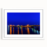 Abstract art print of New Brunswick scenery in muted earth tones on a white framed mat, suitable for dining room decor.