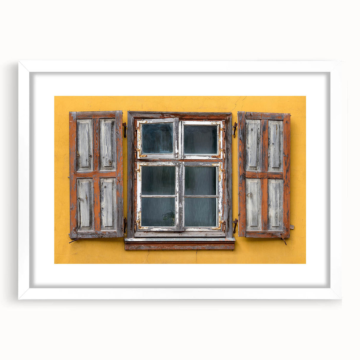 Textured abstract art print depicting Caribbean scenery in muted blue and green tones on a framed white mat.
