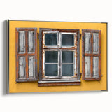 Framed canvas depicting a vintage-style Caribbean landscape with vibrant colors and black accents.