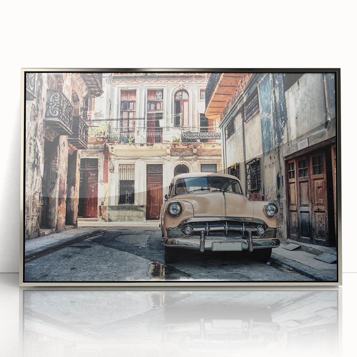 Large art print of a Caribbean beach scene in muted blues and greens, framed in silver acrylic.
